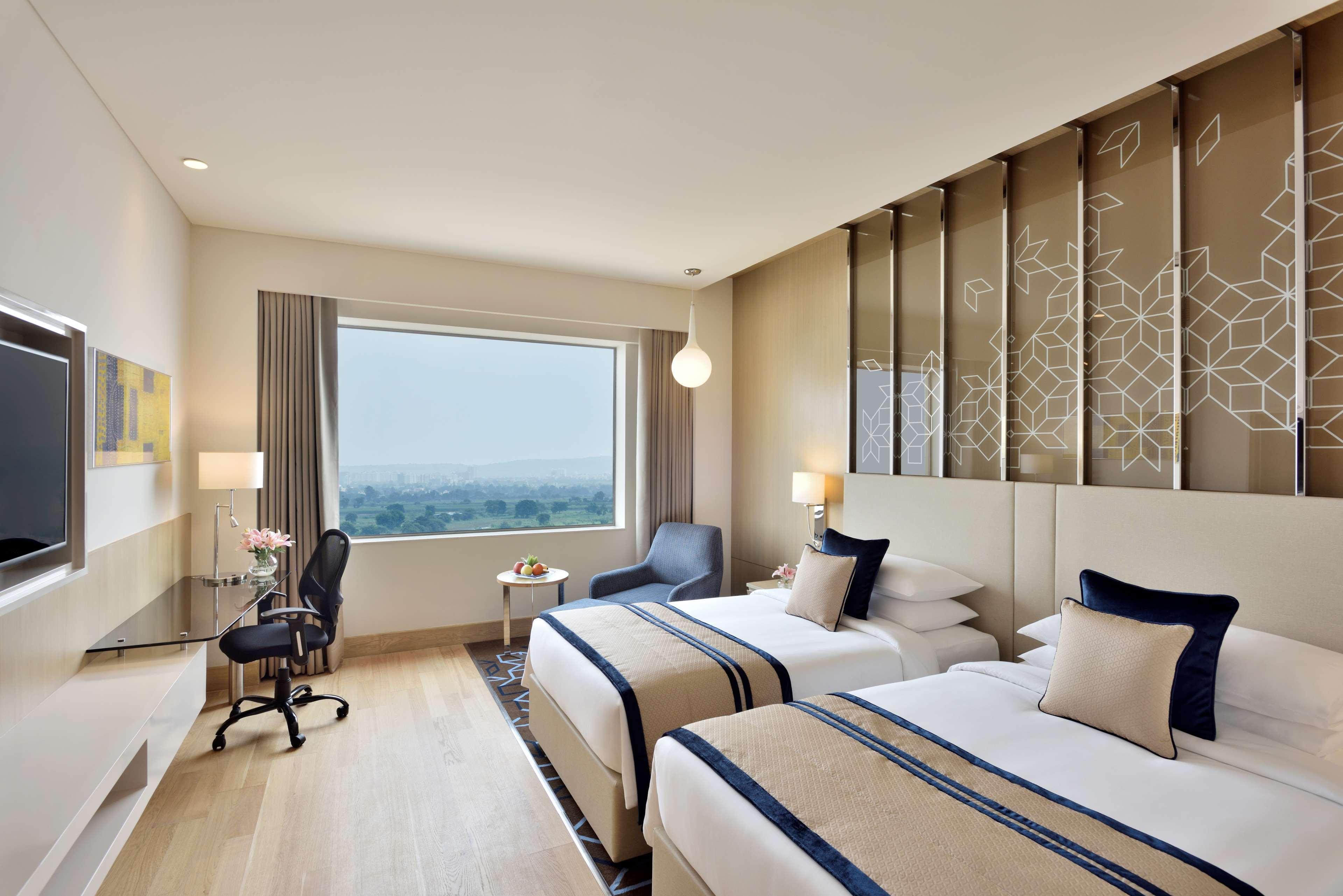 Radisson Gurugram Udyog Vihar Hotel Gurgaon Exterior photo A room at the hotel